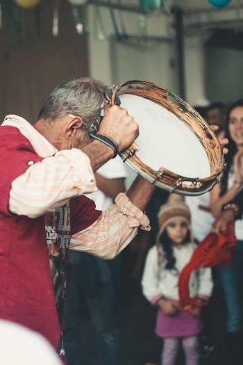 Man Playing Percussion Instrument
