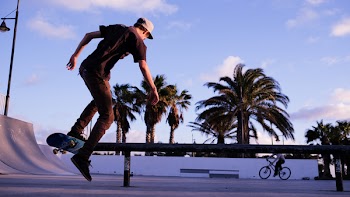Man Playing Skateboard during Daytime