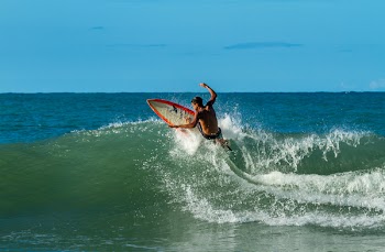 Man Playing Surfing on Big Waves