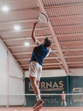 Man Playing Tennis