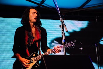 Man Playing The Guitar