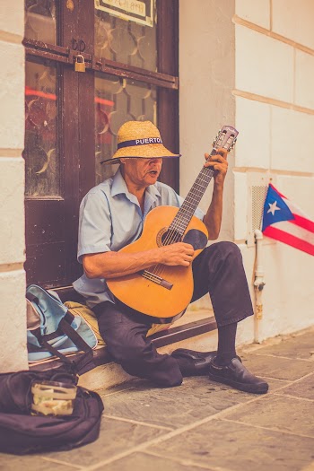 Man Playing The Guitar