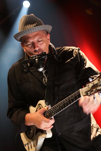 Man Playing The Guitar