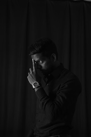 Man Pointing At His Forehead
