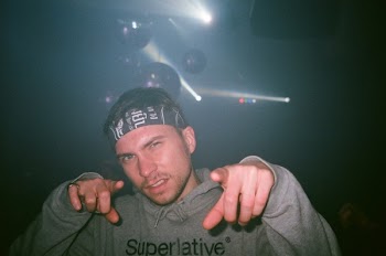Man Pointing Something Under Disco Ball