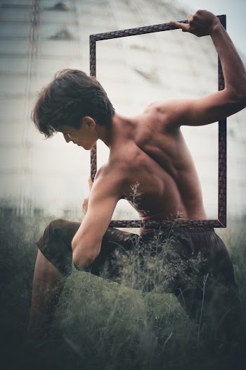 Man Posing With Frame