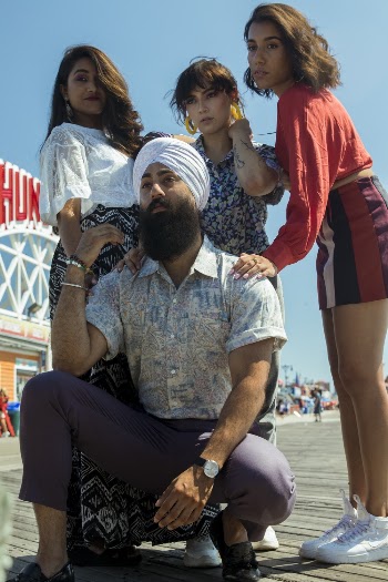 Man Posing With Three Women