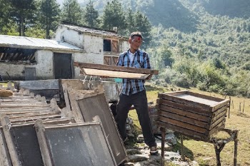 Man producing Lokta bark paper, | Free Photo - rawpixel