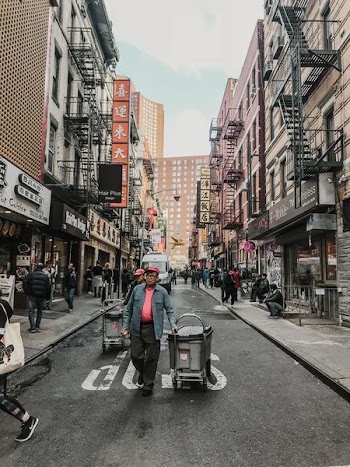 man pulling cart