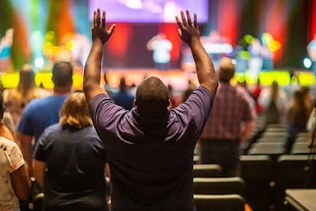 Man Raising His Both Hands