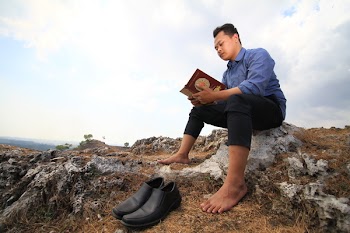 Man Reading a Book