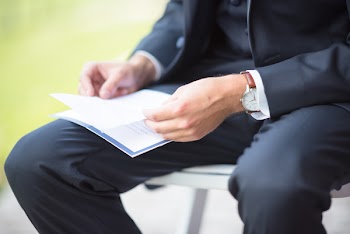 Man Reading A Letter