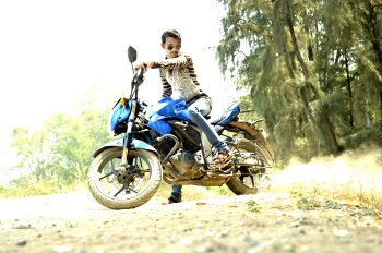 Man Riding Blue Sports Bike