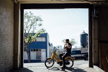 man riding electric motorcycle