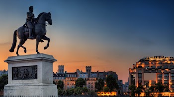Man Riding Horse Sculpture