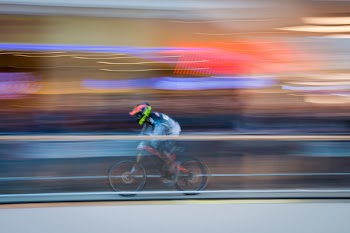 Man Riding in Bicycle