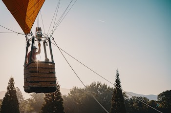Man Riding in Hot Air Balloon