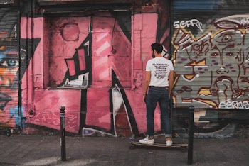 Man Riding Longboard