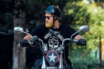 Man Riding Motorcycle