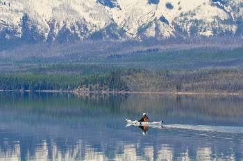 Man Riding on a Boat