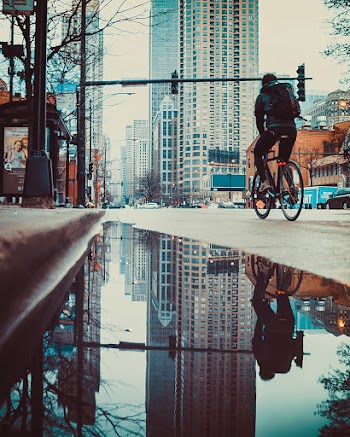 Man Riding on Bicycle