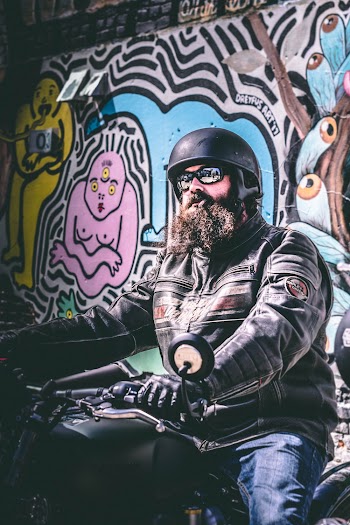 Man Riding on Black Motorcycle