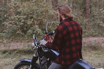 Man Riding on Motorcycle