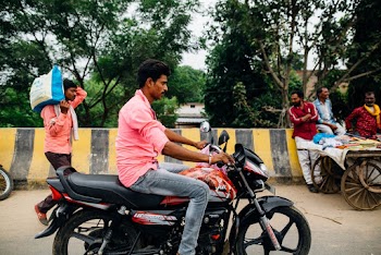 Man Riding on Motorcycle