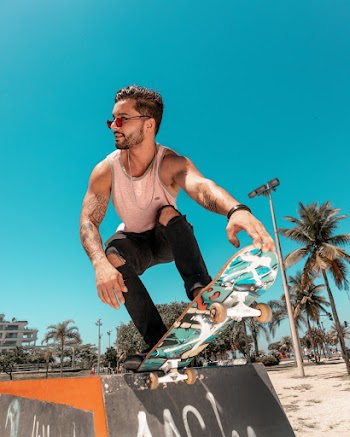 Man Riding on Skateboard
