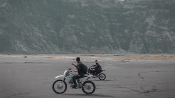 Man Riding on the Dirt Motorcycle