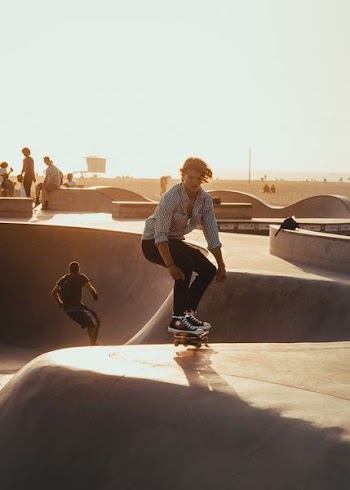 man riding skateboard on skate park during daytime