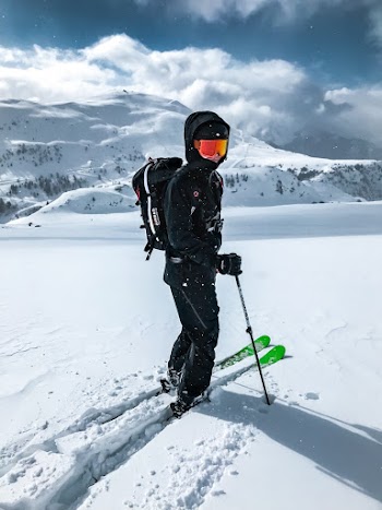 Man riding ski-boards