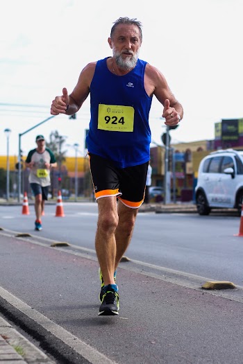 Man Running Marathon Doing Two Thumbs Up