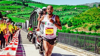 Man Running Near Bridge