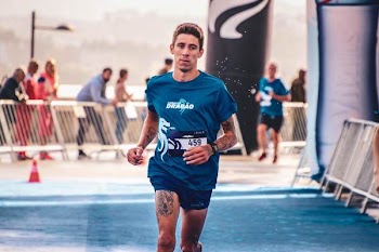 Man Running Near Gray Steel Railings