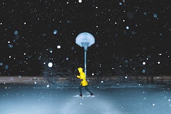 man running on body of water during winter season