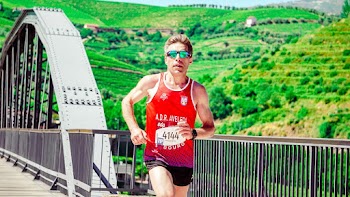 Man Running on Bridge