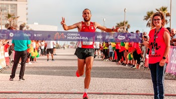 Man Running on Paved Road