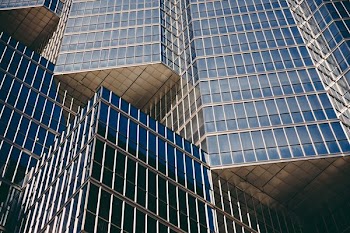 man's eye view of high rise building during daytime