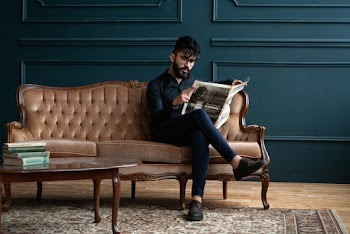 Man Seating On Couch