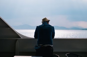 man seeing body of water during daytime
