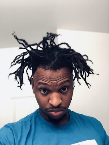 Man Showing His Dreadlocks Hair