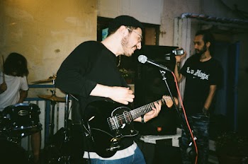 Man Singing And Playing Electric Guitar