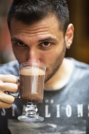 Man Sipping Chocolate Drink