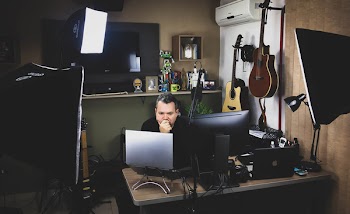 Man Siting in Front of Computer Monitor