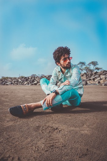 Man Siting on Focus Photography