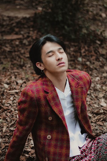 Man Siting on Ground