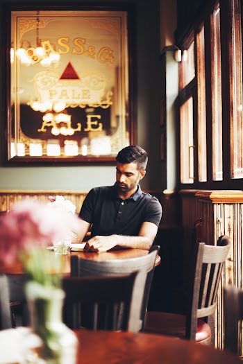 Man Sitting at Table