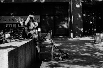 Man Sitting Beside Scooter