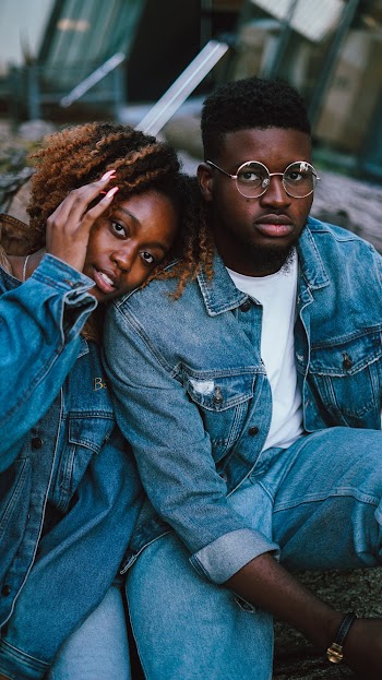 Man Sitting Beside Woman